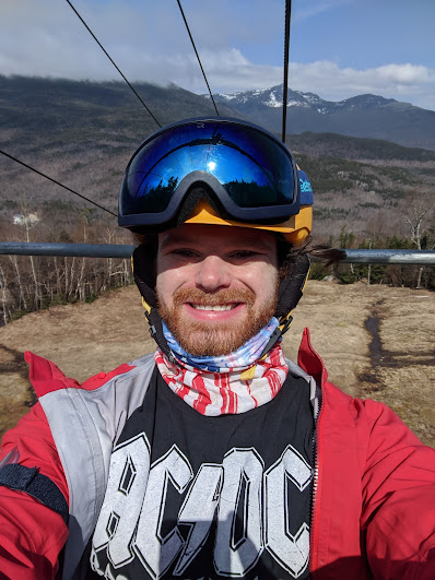 Me on a chairlift at Wildcat Mountain ski area on a spring day